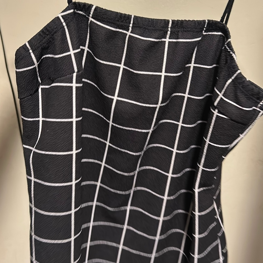 This is a plaid dress that is a size xl